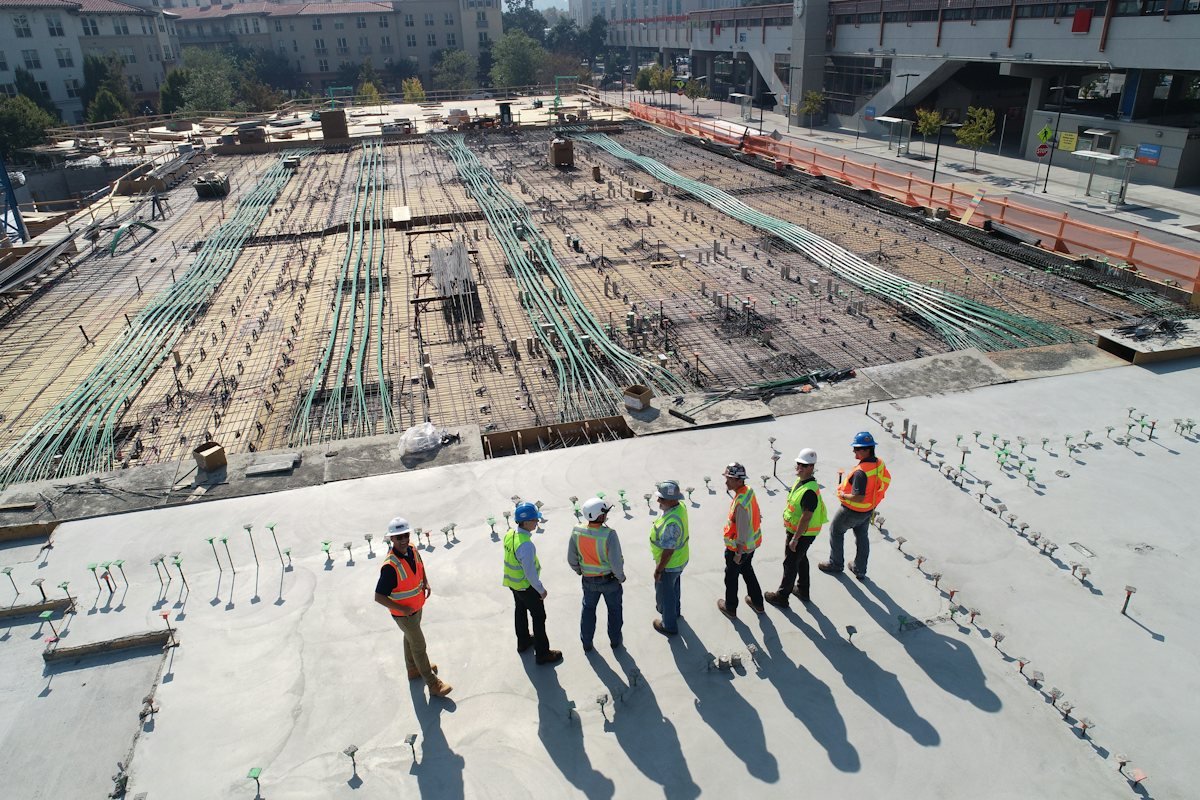 Ecofreak Infra engineers in safety gear on a construction site